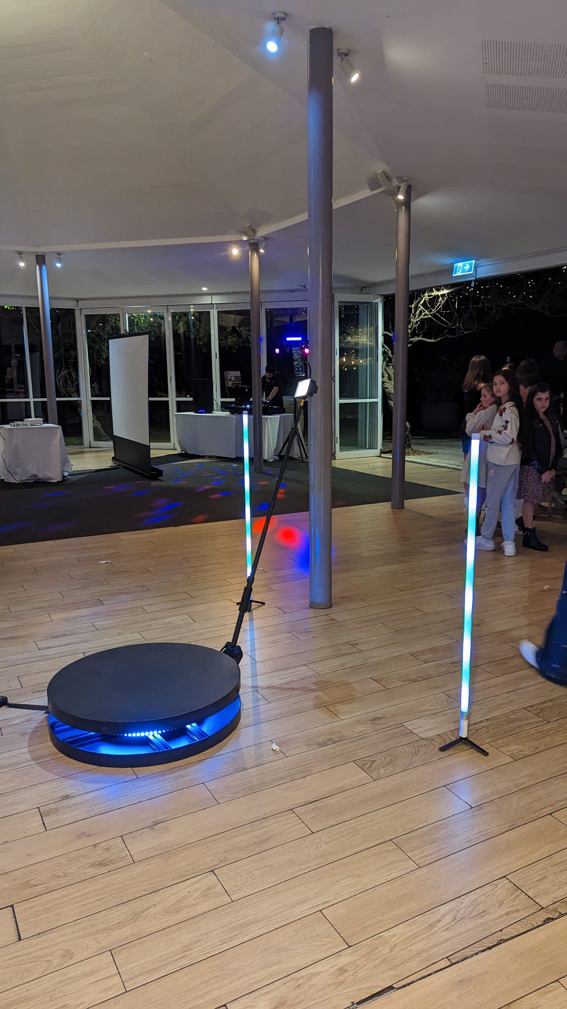 360 photo booth on the dance floor at a Sydney event with LED lighting