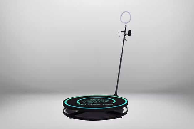 The 360 photo booth you'll receive — LED rotating platform with camera arm and ring light